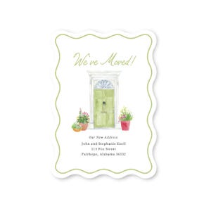 May include: A white moving announcement card with a scalloped edge and a green border. It features a watercolor illustration of a green door with potted plants and the text: We've Moved! Our New Address: John and Stephanie Ezell 113 Fox Street Fairhope, Alabama 36532.
