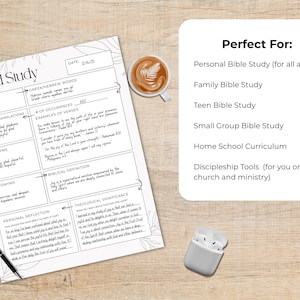 May include: A Word Study worksheet with the word "JOY" at the top, along with sections for English translations, synonyms, antonyms, and biblical definitions. A cup of coffee, a pen, and a pair of wireless earbuds are also on the wooden surface.