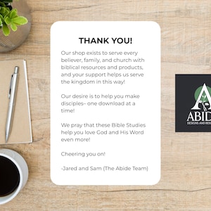 May include: A thank you note with text, a logo, a notepad, a pen, and a cup of coffee on a wooden surface. The text reads: "Our shop exists to serve every believer, family, and church..." The logo says "ABIDE DESIGNS AND RESOURCES."