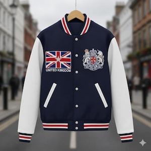 May include: Navy blue varsity jacket with white sleeves. Features the United Kingdom flag and text "UNITED KINGDOM" on the chest, along with a crest. The jacket has red and white striped accents on the collar, cuffs, and hem.