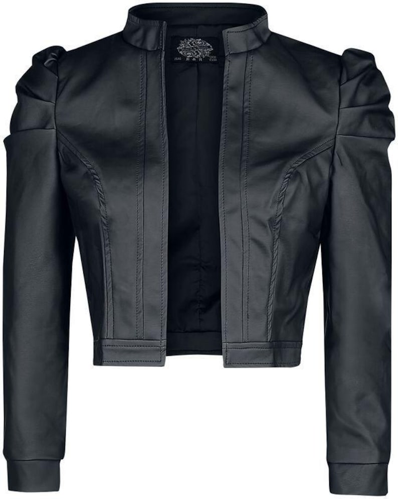 May include: Black cropped jacket with a stand-up collar and puffed sleeves. The jacket features vertical seams and a tailored fit. The open front design and cropped length create a stylish silhouette. The jacket is made of a smooth, dark material.