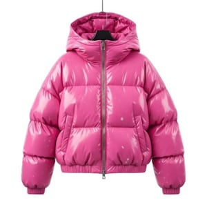 May include: A bright pink puffer jacket with a shiny, glossy finish. The jacket features a hood, a full-length zipper, and two side pockets. The puffy design is visible throughout the jacket, with a slightly cropped fit.