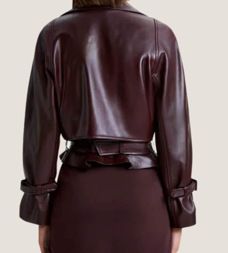 12. Waist belt and zipper detail of cropped leather streetwear coat