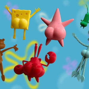 May include: A collection of cartoon character figurines, including a yellow sponge, a pink starfish, a green plankton, a brown squirrel, a red crab, and a light blue squid. The characters are set against a blue background with yellow and green star-shaped designs.