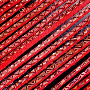 17 strips of ethnic embroidery from SE China - Hmong Miao minority | geometric patterns on red cotton for sewing quilting | vintage textiles
