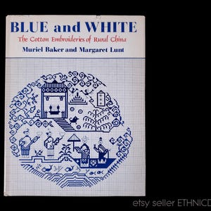 May include: A book titled "BLUE and WHITE" with the subtitle "The Cotton Embroideries of Rural China" by Muriel Baker and Margaret Lunt. The cover features a blue and white illustration of a Chinese village scene.