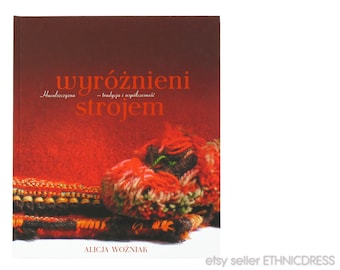 May include: Book cover with the title "Wyróżnieni strojem" in red text. The subtitle is "Huculszczyzna - tradycja i współczesność". The cover features a close-up of colorful yarn.
