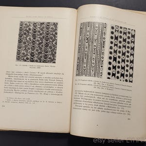 May include: A black and white book with pages of text and images of traditional folk art patterns. The book is titled "Polskie wzory ludowe" and the text is in Polish.