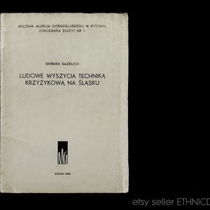 May include: A book cover with the title "Ludowe Wyszycia Technika Krzyzykowa Na Slasku" by Barbara Bazielich. The book is a publication of the Upper Silesian Museum in Bytom, Poland.