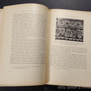 May include: A page from a vintage book about lacemaking, featuring a black and white image of a delicate lace pattern with floral motifs. The text on the page is in Polish.