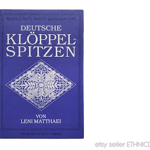 May include: A blue book titled "Deutsche Klöppel Spitzen" by Leni Matthaei. The book cover features a silver-colored lace design and the text "Reprint nach dem Original von 1925".