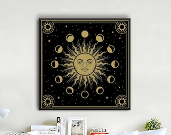 May include: A framed print depicting a golden sun with a smiling face and moon phases against a black backdrop. The artwork has a celestial theme and is framed in a black border. The print is suitable for wall decor.