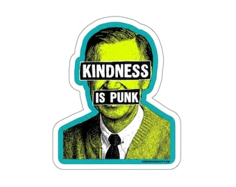 May include: A die-cut sticker featuring a lime green and black graphic illustration of a person wearing a collared shirt and cardigan. Two black rectangular bars cover the eyes, displaying the white text KINDNESS IS PUNK.