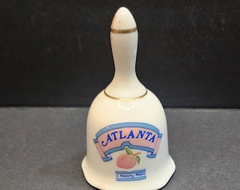 Campana de mano vintage de cerámica y porcelana, campana de Atlanta coleccionable