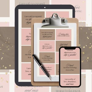May include: An image featuring affirmation cards, a tablet, and a smartphone. The cards and devices display affirmations in a soft color palette of pink, brown, and beige. A pen rests on a clipboard, and gold glitter accents the background.