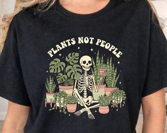 Camiseta "Plantas, no personas", camiseta de algodón negra, estampado DTG.