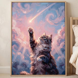 Könnte beinhalten: Gerahmtes Gemälde einer Katze, die nach einem Sternschnuppen greift, vor einem Hintergrund aus rosa und blauen Wolken. Die Katze, mit braunem und grauem Fell, steht auf ihren Hinterbeinen. Das Gemälde hat eine weiche, traumhafte Qualität, mit einem Holzrahmen.