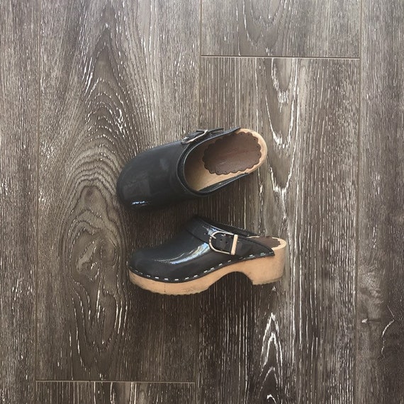 leather wooden clogs