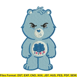 May include: A light blue embroidered bear with an angry expression. The bear has a cloud and heart design on its belly. The image includes the text "Files Format: DST, EXP, CND, XXX, JEF, HUS, PES, PDF, SEW."