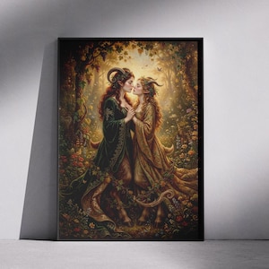 May include: A framed art print depicting two figures with horns and flowing gowns in a forest setting. The figures, one in green and the other in gold, are embracing. The artwork features a detailed, fantasy-themed illustration with a warm color palette and floral elements.