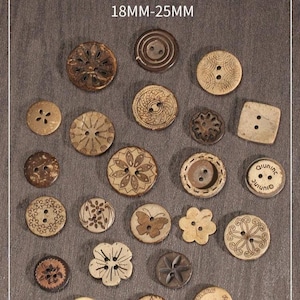 May include: A collection of various wooden buttons in different shapes and sizes. The buttons feature carved designs, including floral patterns, butterflies, and geometric shapes. Sizes range from 18mm to 25mm.