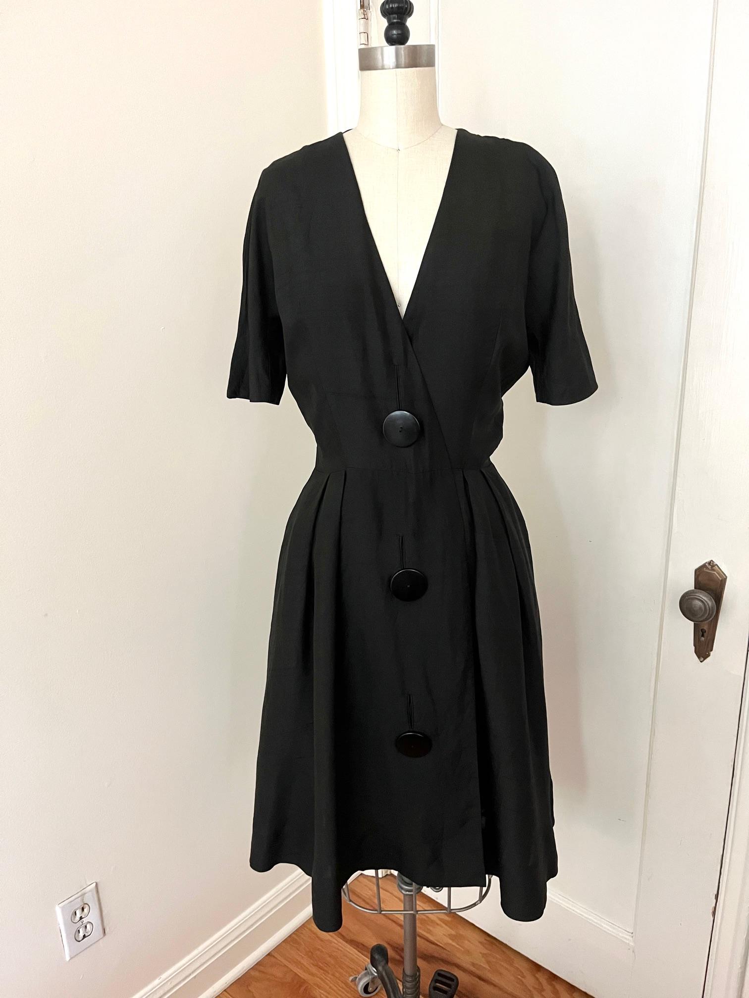 1980s black dress 1980s Vintage Black Knit Party Dress with Gold Sequin Bows main image 0