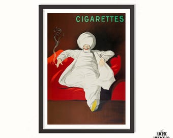 May include: Vintage poster print featuring a man in white robes and a turban, seated on a red couch, smoking a cigarette. The word "CIGARETTES" is in green at the top. The poster has a brown background.