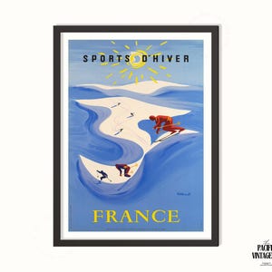 May include: Vintage travel poster for France, featuring skiers on a snowy mountain slope. The poster has a blue background with yellow text that reads "SPORTS D'HIVER" and "FRANCE". A yellow sun is at the top.