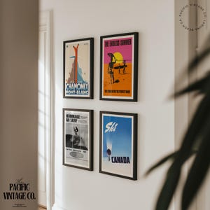 May include: Four framed vintage travel posters on a white wall. The posters feature ski and surf themes, with text including "CHAMONIX MONT-BLANC", "THE ENDLESS SUMMER", "HOMMAGE AU SURF", and "CANADA". The Pacific Vintage Co. logo is in the corner.