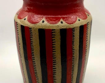 Hand carved scalloped and striped vase