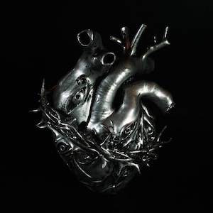 May include: A rustic wooden sign with the text "Welcome to our home" in a handwritten style. The sign features a distressed finish and a simple, inviting design, perfect for a front porch or entryway.