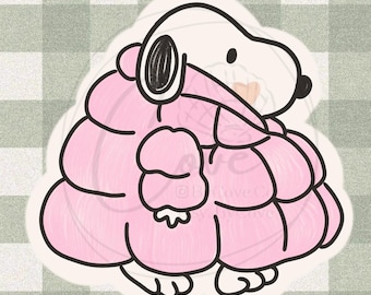 May include: A sticker featuring a cartoon dog character in a pink puffy coat. The dog has black ears and a black spot on its head. The sticker is outlined in black and set against a green and white checkered background.