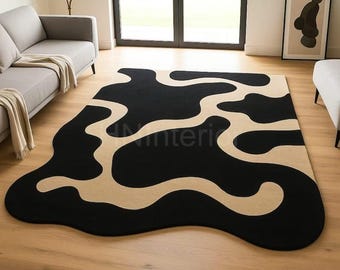 Alfombra abstracta negra y beige / Forma orgánica ondulada