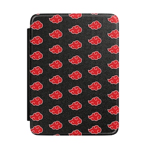 Puede incluir: Funda negra para lector de libros electrónicos con un patrón de nubes rojas. La funda tiene un aspecto texturizado y un cierre magnético. Las nubes rojas están delineadas en blanco.