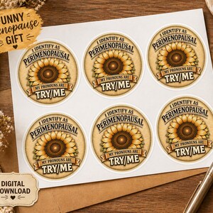 May include: Sheet of round stickers with a sunflower design. Each sticker has the text "I Identify as Perimenopausal, My Pronouns Are Try Me." The stickers are on a white sheet with a brown background. The words "Funny Menopause Gift" are also visible.