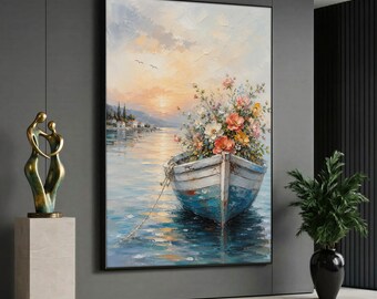 May include: A framed oil painting depicting a weathered blue wooden rowboat filled with a vibrant bouquet of colorful flowers floating on calm water at sunset, with a distant shoreline and soft clouds visible in the warm, golden sky.