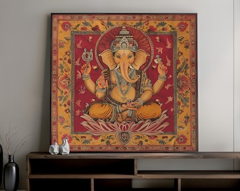 May include: A framed artwork depicting the Hindu deity Ganesha. The artwork features a seated Ganesha with an elephant head, adorned in gold and orange hues, set against a red and yellow floral background. The frame is dark brown.