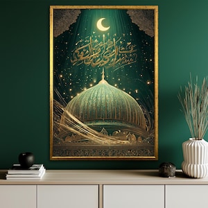 May include: A framed art print featuring a mosque dome in shades of green and gold. The artwork includes Arabic calligraphy, a crescent moon, and a starry night sky. The print is displayed in a gold frame.