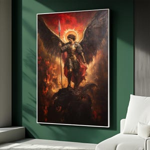 May include: A framed painting of a warrior angel with large wings, holding a spear and standing on a dark creature. The artwork features a fiery background with a halo around the angel's head, rendered in warm tones.