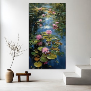 May include: A vertical canvas print of a serene pond scene. Pink water lilies float on the water's surface, surrounded by lily pads. The water reflects the sky and the flowers, creating a tranquil and colorful artwork.