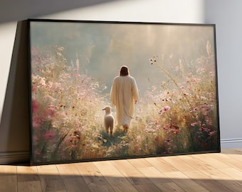 May include: Framed art print depicting a figure in a white robe walking through a field of pink and white flowers, followed by a lamb. The artwork has a soft, ethereal quality, with a focus on light and shadow. The frame is black.