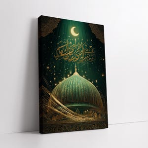 May include: A canvas print featuring a mosque with a green dome and gold accents. The artwork includes Arabic calligraphy, a crescent moon, and a starry night sky. The overall color scheme is dark green and gold.