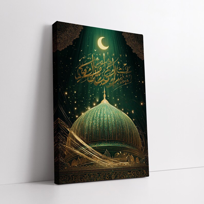 May include: A canvas print featuring a mosque with a green dome and gold accents. The artwork includes Arabic calligraphy, a crescent moon, and a starry night sky. The overall color scheme is dark green and gold.