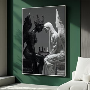May include: A framed black and white art print depicting two figures with wings, one black and one white, facing each other over a chessboard. The black figure wears a crown, while the white figure has long hair. The artwork is displayed on a green wall.