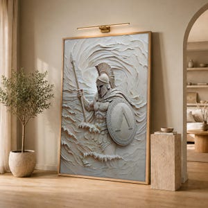 May include: A large rectangular wall art piece featuring a textured, off-white relief sculpture of a Spartan warrior in a helmet, holding a spear and a round shield with a Greek lambda symbol, set against a swirling, wave-like background.