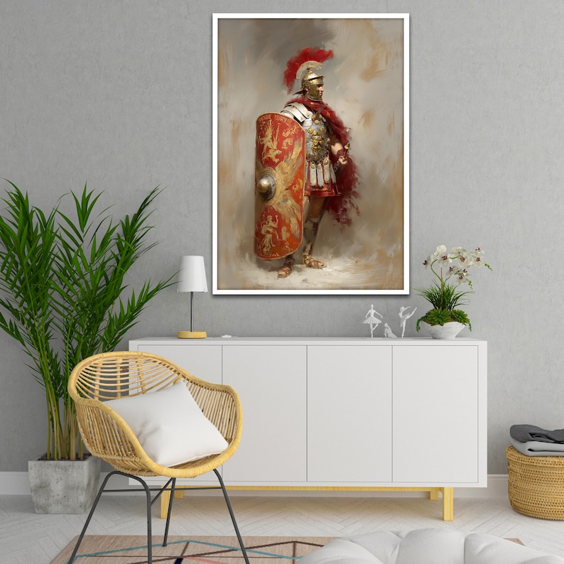 May include: A framed print of a Roman soldier in full armor, holding a shield. The soldier wears a red plume helmet, a red cape, and a detailed breastplate. The shield is red and gold with a detailed emblem. The artwork is displayed on a white cabinet.