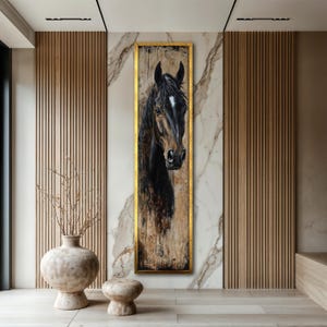 May include: A framed vertical painting of a horse's head. The horse has a dark brown coat with a white blaze on its face. The painting is set against a textured background and framed in gold.