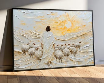 May include: A framed artwork depicting a figure in white robes leading a flock of sheep. The textured painting features a warm, golden sun in the background and a serene, pastoral scene. The artwork is framed in a black border.