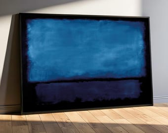May include: Abstract art print featuring a dark blue and navy blue rectangular design on a black background. The artwork is framed in a black frame and leans against a wall. The painting has a minimalist aesthetic.