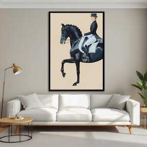 May include: A framed art print depicts a black horse in a dressage pose with a rider in formal attire. The artwork features a black frame and a neutral background, creating a classic equestrian theme.